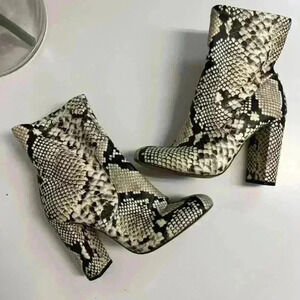 Call It Spring snakeskin booties